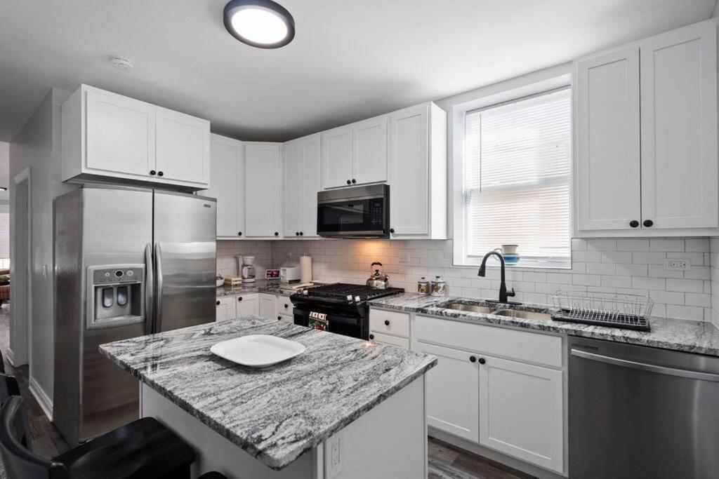 Newly Rehabbed Greystone With 2 Private Apartments, Backyard, Garage, Laundry, Close To Expressway